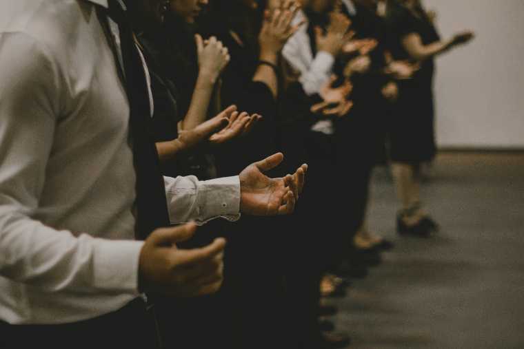 Hands raised in worship
